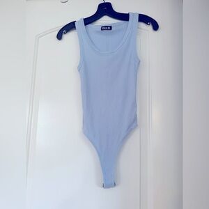 Suzi Kondi Blue Ribbed Bodysuit   Sz XS
NWOT!